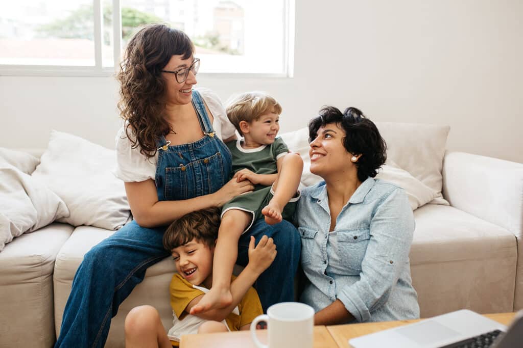 happy family with two kids on a couch