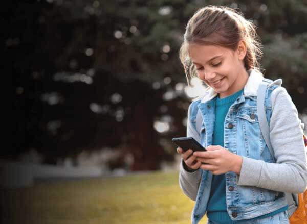 smiling girl on phone