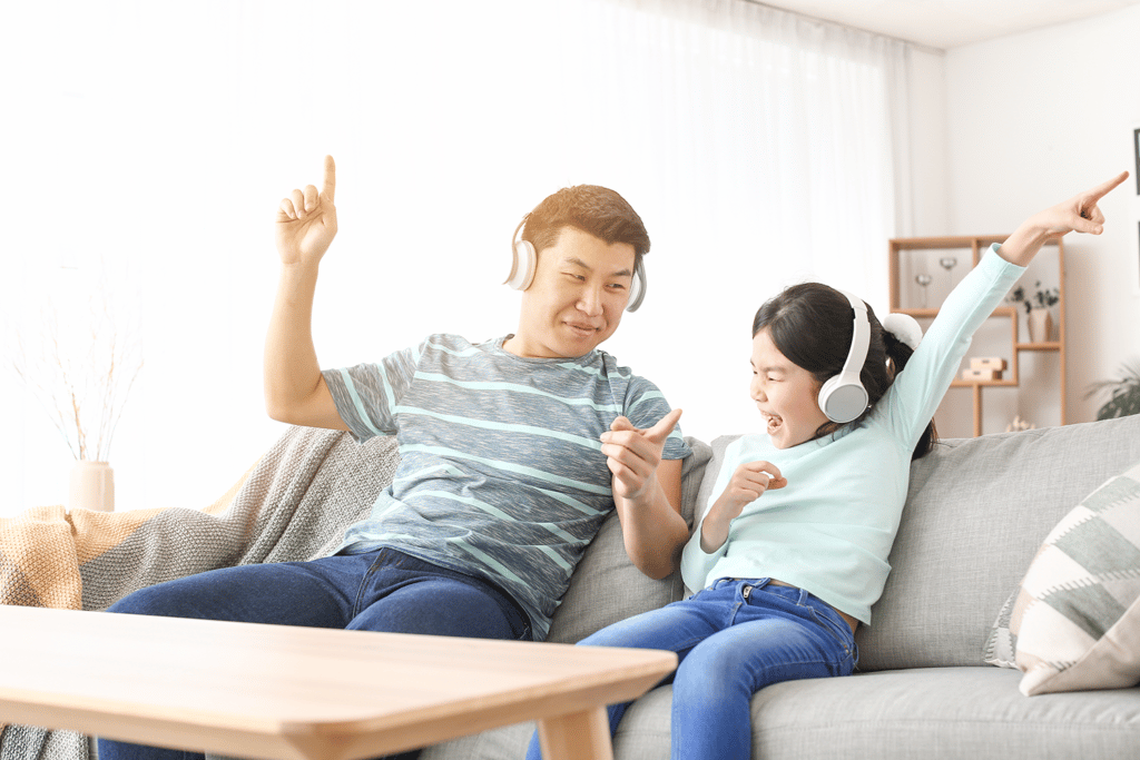 dad and daughter jamming out to gabb music