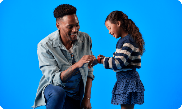 father and daughter looking at gabb watch 3